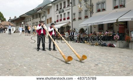 stock-photo-gruyere-switzerland-july-swiss-musicians-play-the-folk-national-musical-instrument-4.jpg