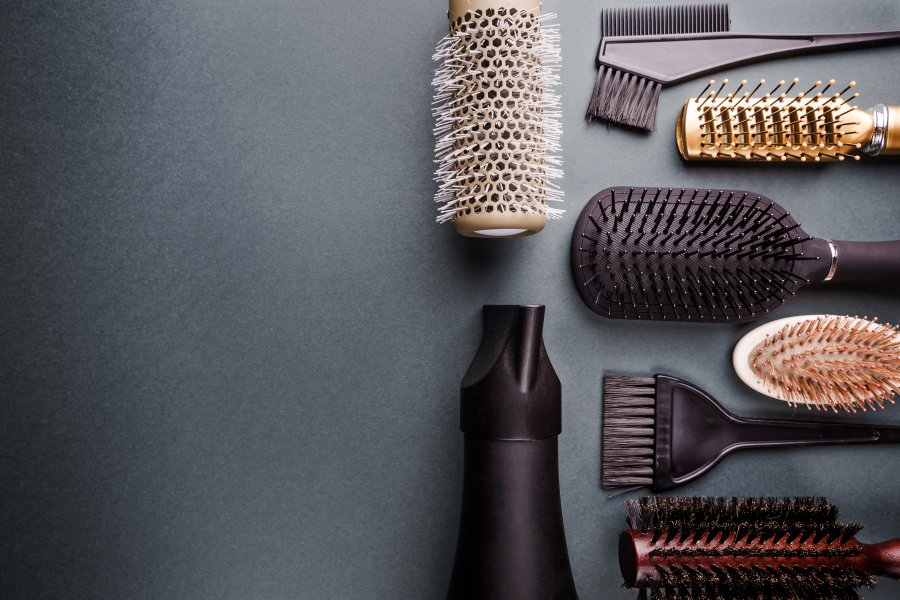 various-hair-dresser-tools-black-background-with-copy-space.jpg