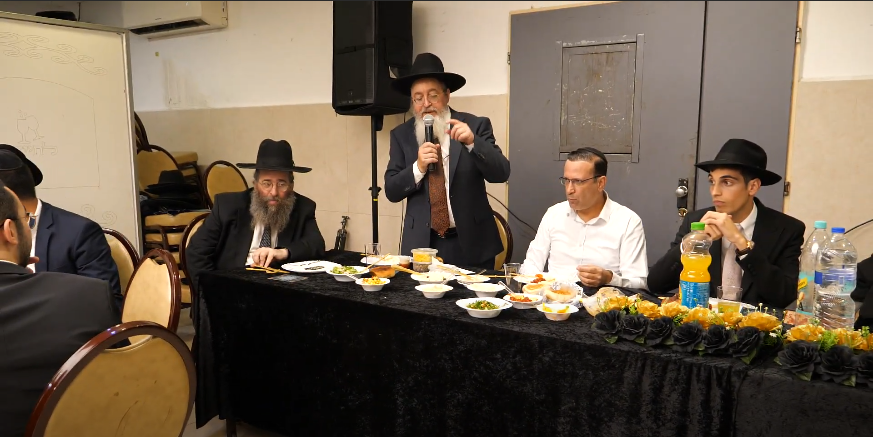 אביו הרב חיים מאיר רז.png