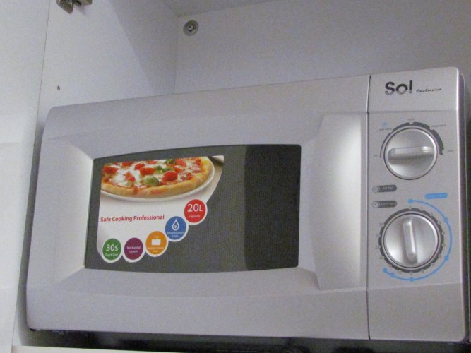 מיקרוגל חדש! (לא השתמשו בו אף פעם).