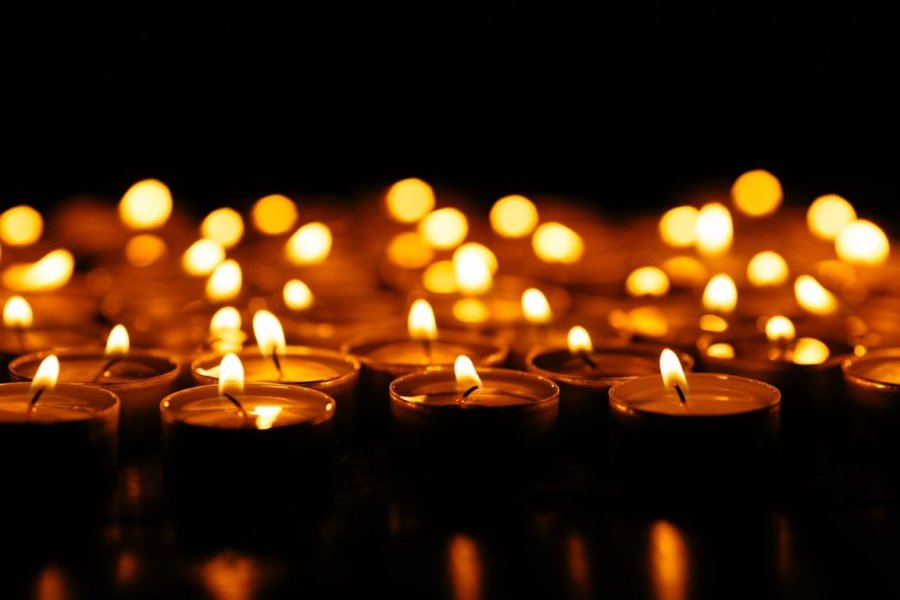 candles-set-lighting-candles-dark (Medium).jpg