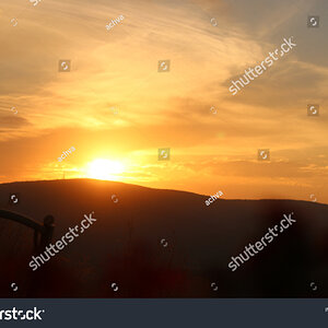 stock-photo-orange-sky-as-the-sun-sets-1979137898.jpg