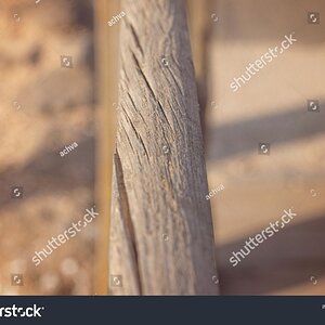 stock-photo-close-up-of-a-natural-wooden-beam-2002001591.jpg